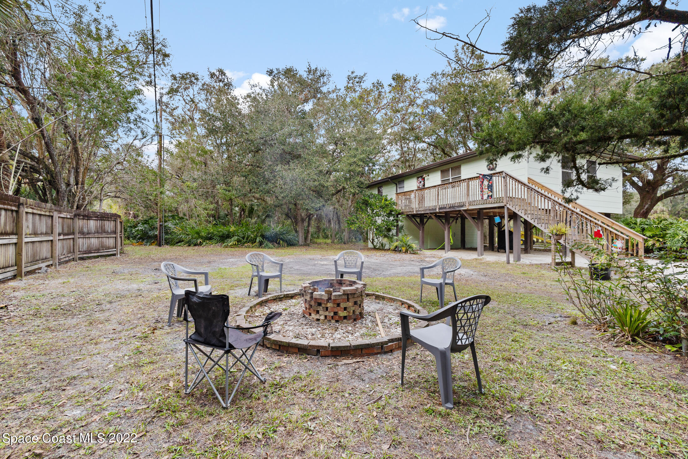 5480 Citrus Boulevard Cocoa, FL 32926 - Photo 4 of 43 a view of a house with backyard and sitting area