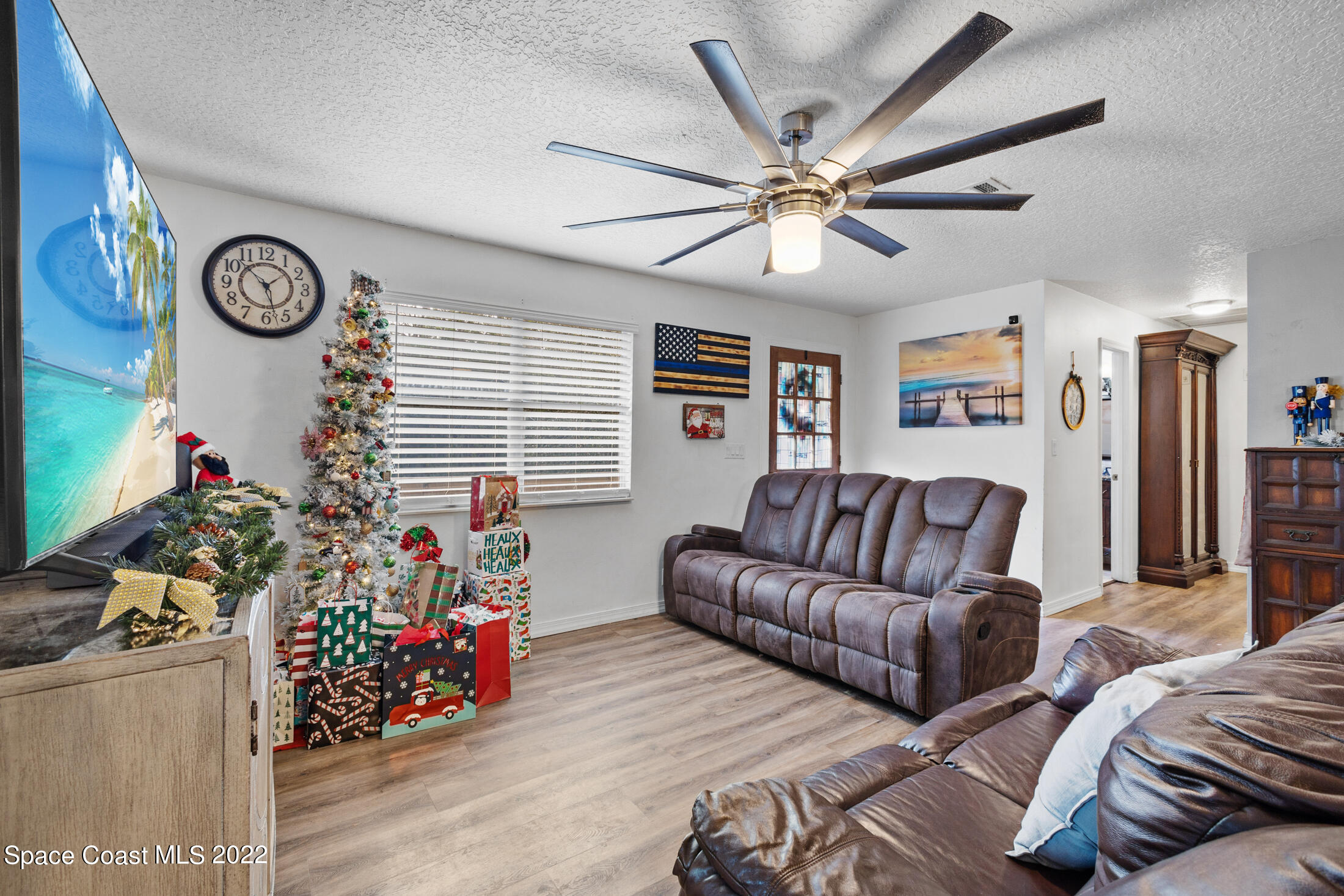 5480 Citrus Boulevard Cocoa, FL 32926 - Photo 8 of 43 a living room with furniture and a window