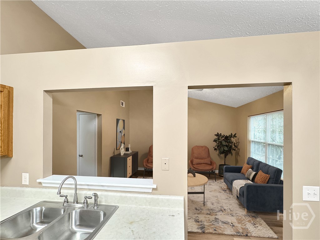 33 Quail Forest Drive Savannah, GA 31419 - Photo 11 of 21 Looking from Kitchen to virtually staged Great Room.