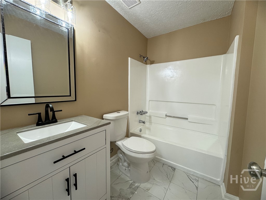 33 Quail Forest Drive Savannah, GA 31419 - Photo 14 of 21 Hall Bathroom