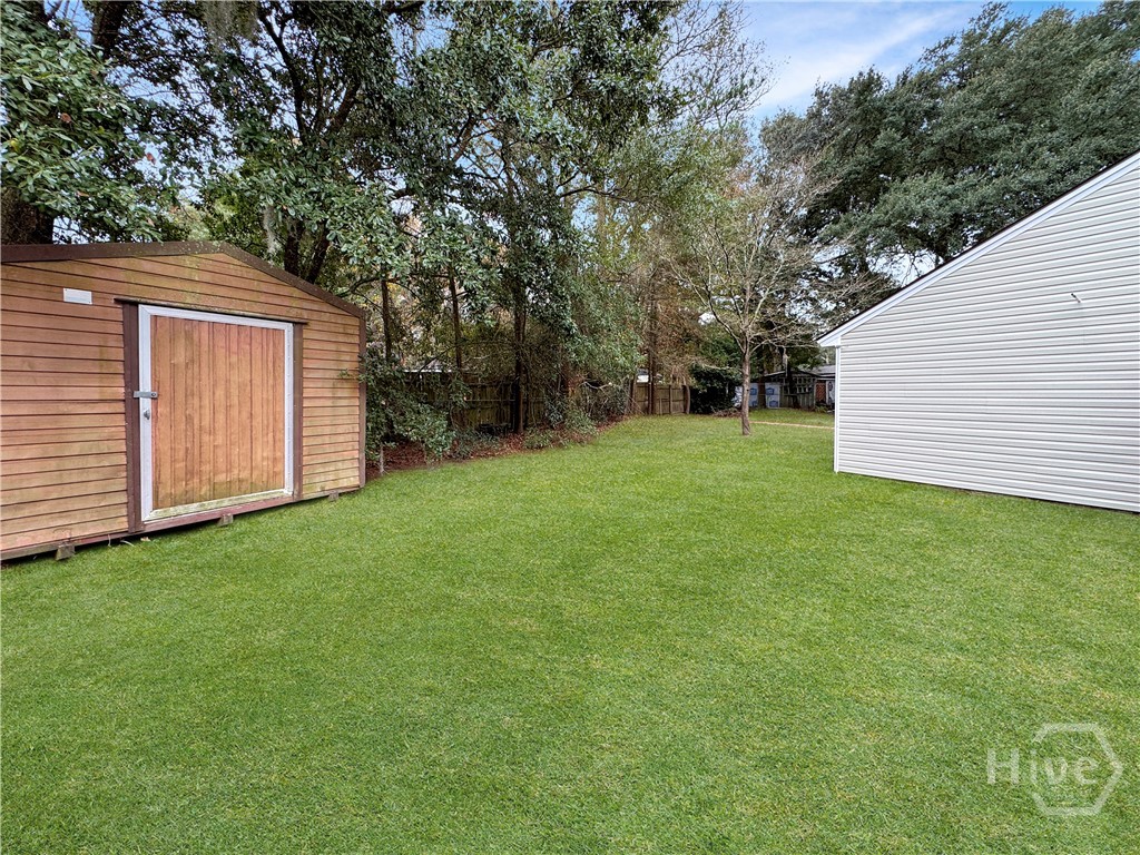 33 Quail Forest Drive Savannah, GA 31419 - Photo 20 of 21 Large storage unit in backyard