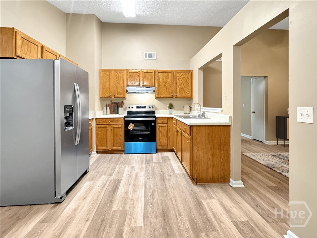 33 Quail Forest Drive Savannah, GA 31419 - Photo 10 of 21 Virtually Staged Kitchen with All New Appliances.