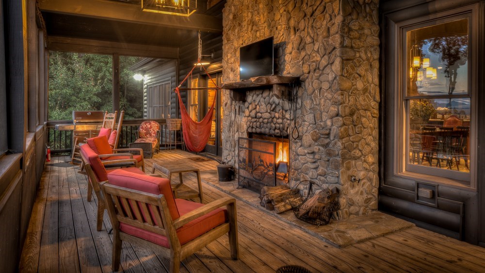 239 Ridge Top Drive Ellijay, GA 30536 - Photo 45 of 92 a outdoor living space with patio furniture and wooden floor