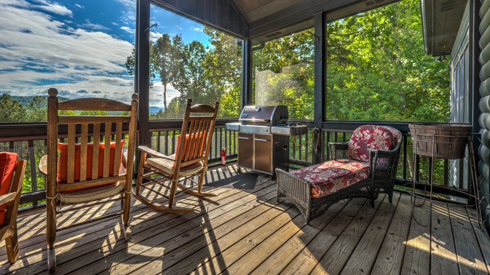 239 Ridge Top Drive Ellijay, GA 30536 - Photo 49 of 92 a view of a chairs on the roof deck