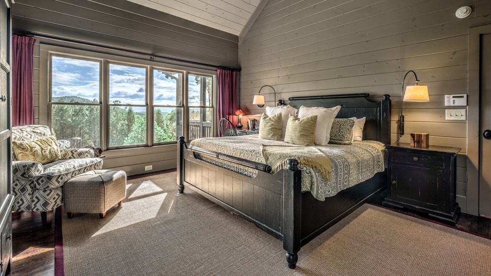 239 Ridge Top Drive Ellijay, GA 30536 - Photo 50 of 92 a bed room with a bed and a large window