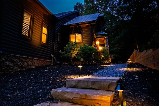 a backyard of a house with seating space
