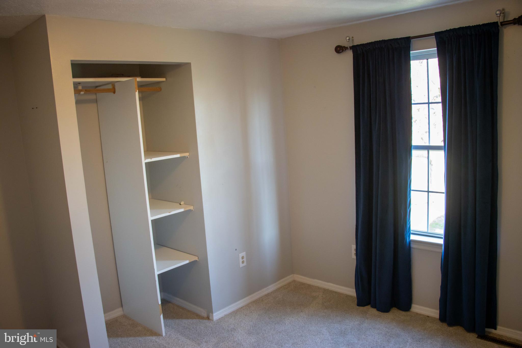387 West Ridge Loop Road Romney, WV 26757 - Photo 20 of 58 Top Level- Bedroom #2 (second door on left)