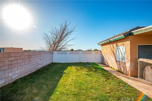 a view of a entryway door and dining room