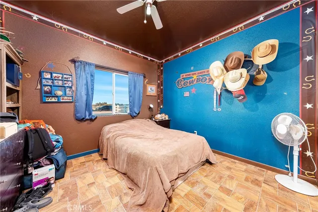 a bathroom with a sink mirror vanity and toilet