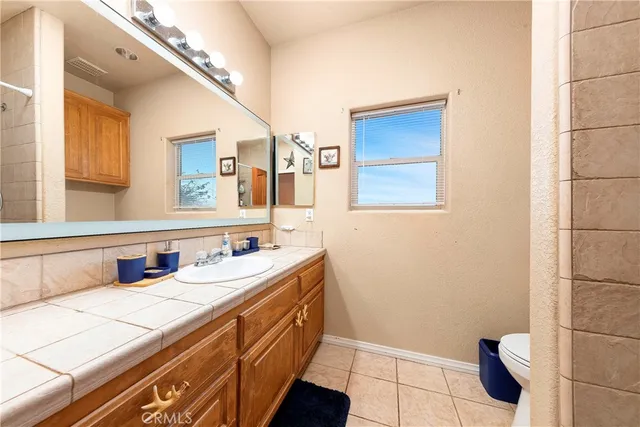 an aerial view of residential building and ocean