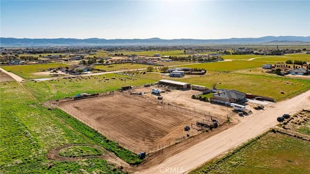 a view of a swimming pool with a lounge chair