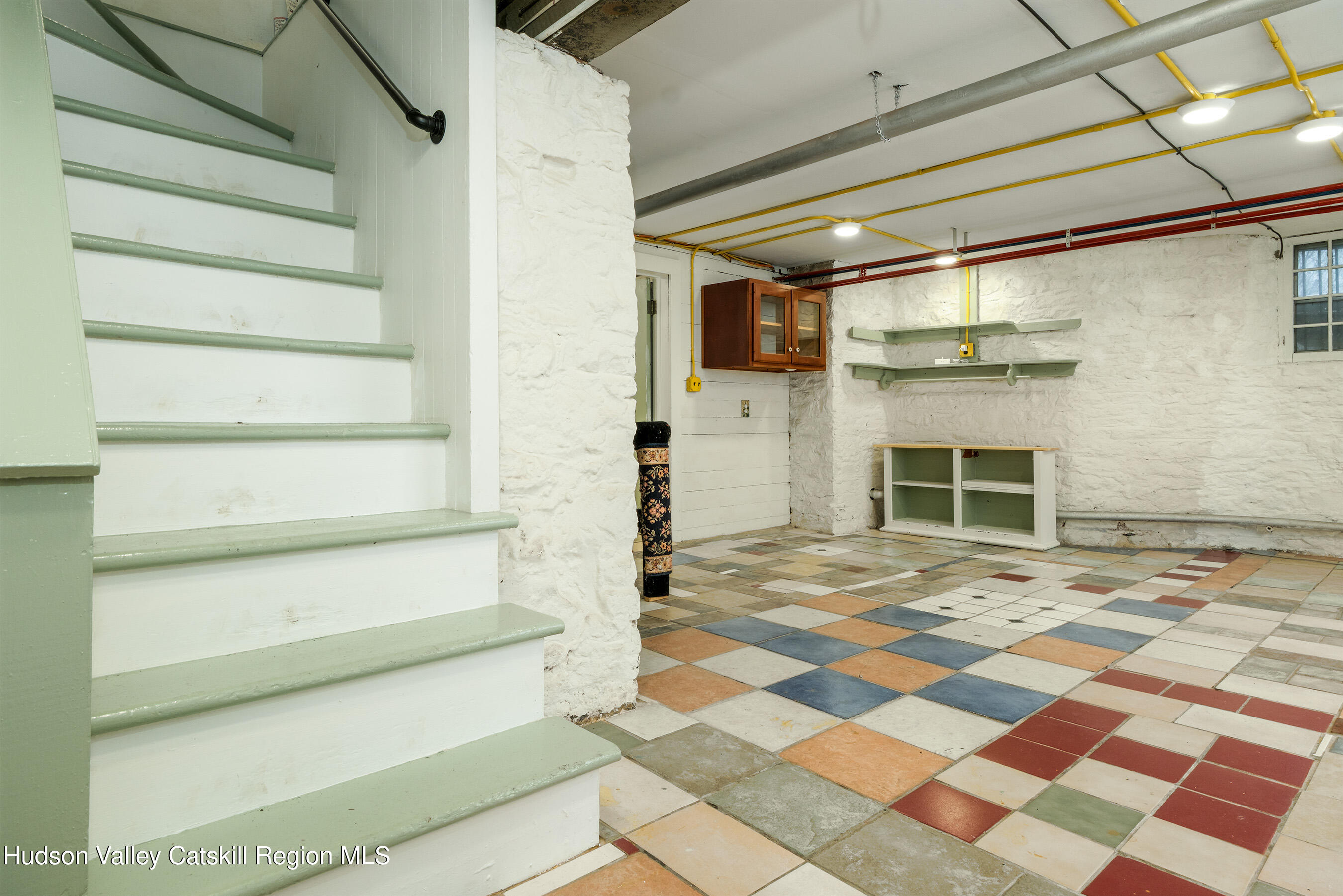6 Westridge Road Cooperstown, NY 13326 - Photo 107 of 119 a view of a hall with wooden floor and a fireplace