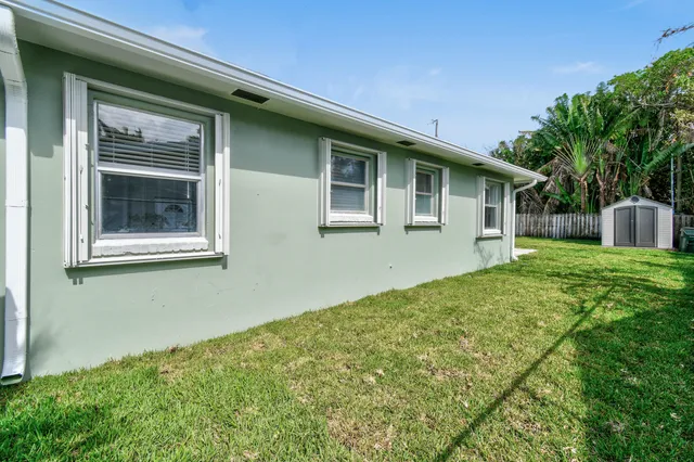 a house view with a garden space