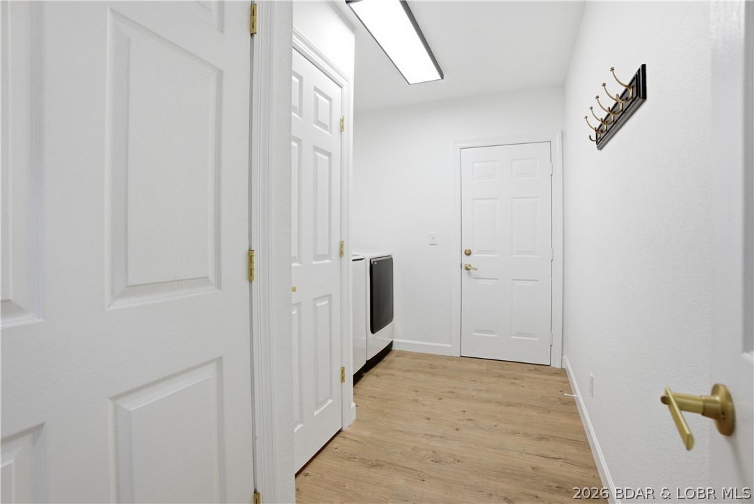 5488 Pebble Lane Osage Beach, MO 65065 - Photo 28 of 34 Main level laudry