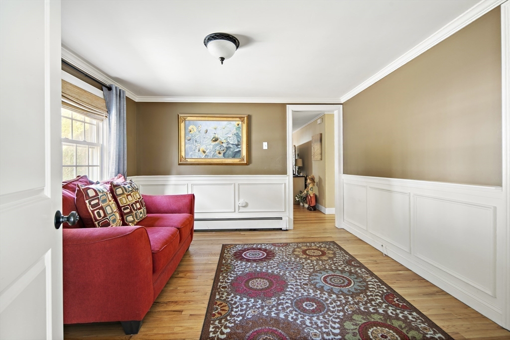 38 Sutcliffe Avenue Canton, MA 02021 - Photo 23 of 29 a living room with furniture and a rug