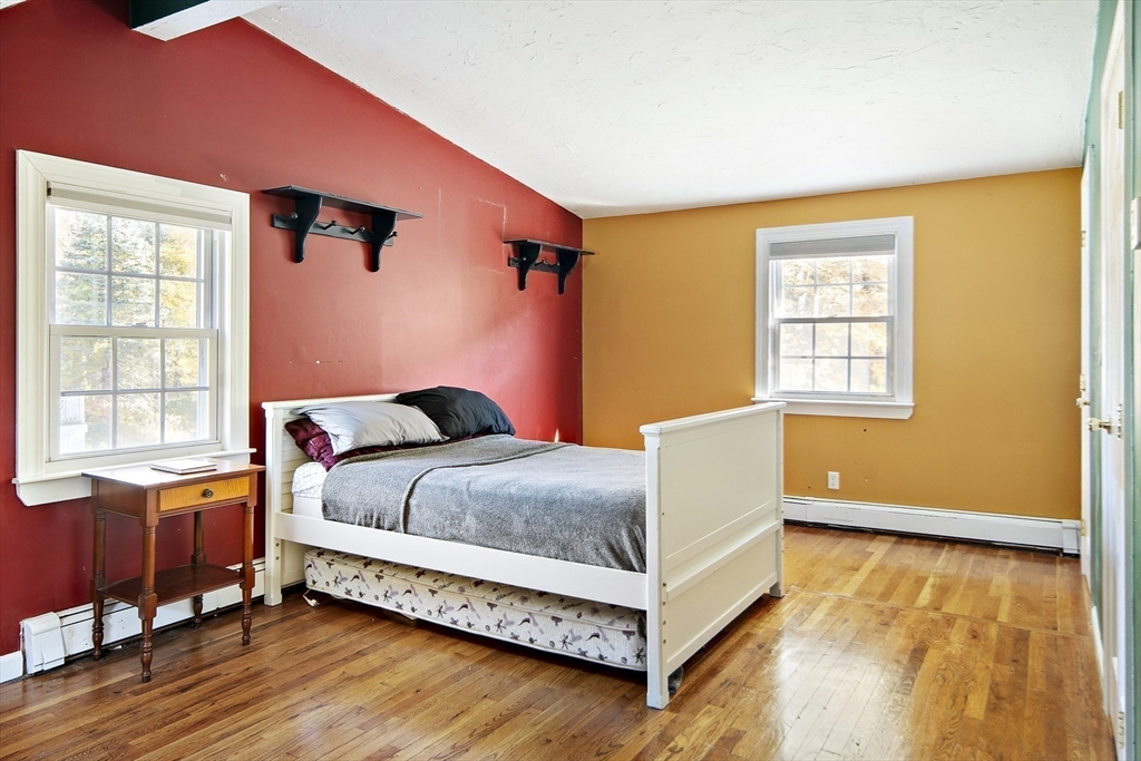 38 Sutcliffe Avenue Canton, MA 02021 - Photo 28 of 29 a bedroom with a bed and window