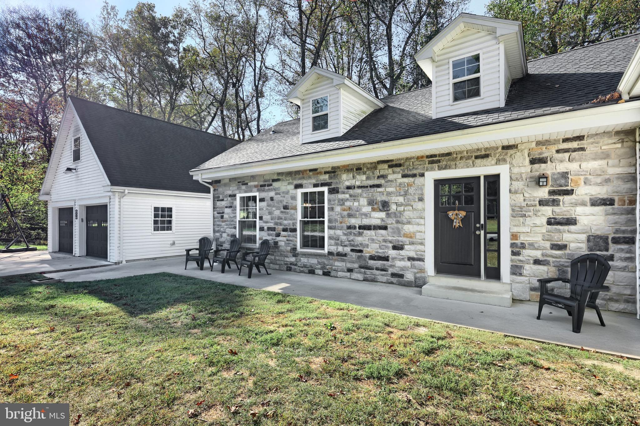 755 River Road York Haven, PA 17370 - Photo 16 of 58 a view of a house with backyard and sitting area