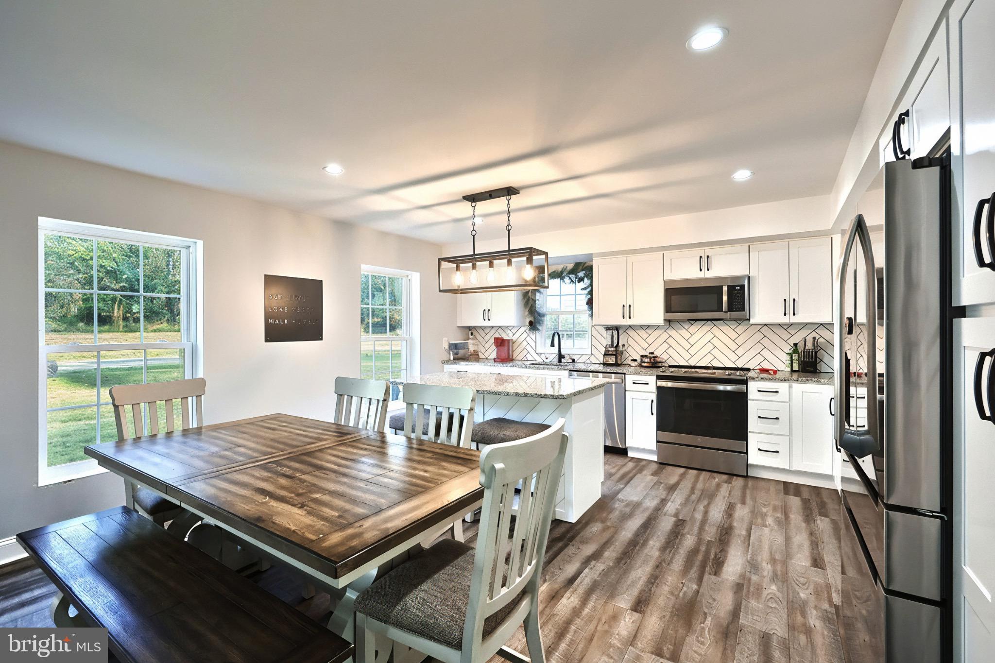 755 River Road York Haven, PA 17370 - Photo 24 of 58 a open kitchen with a stove and white cabinets
