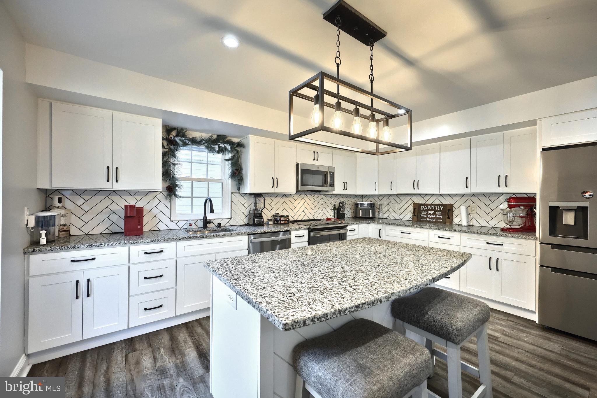 755 River Road York Haven, PA 17370 - Photo 25 of 58 a kitchen with granite countertop a counter space cabinets stainless steel appliances and a counter space