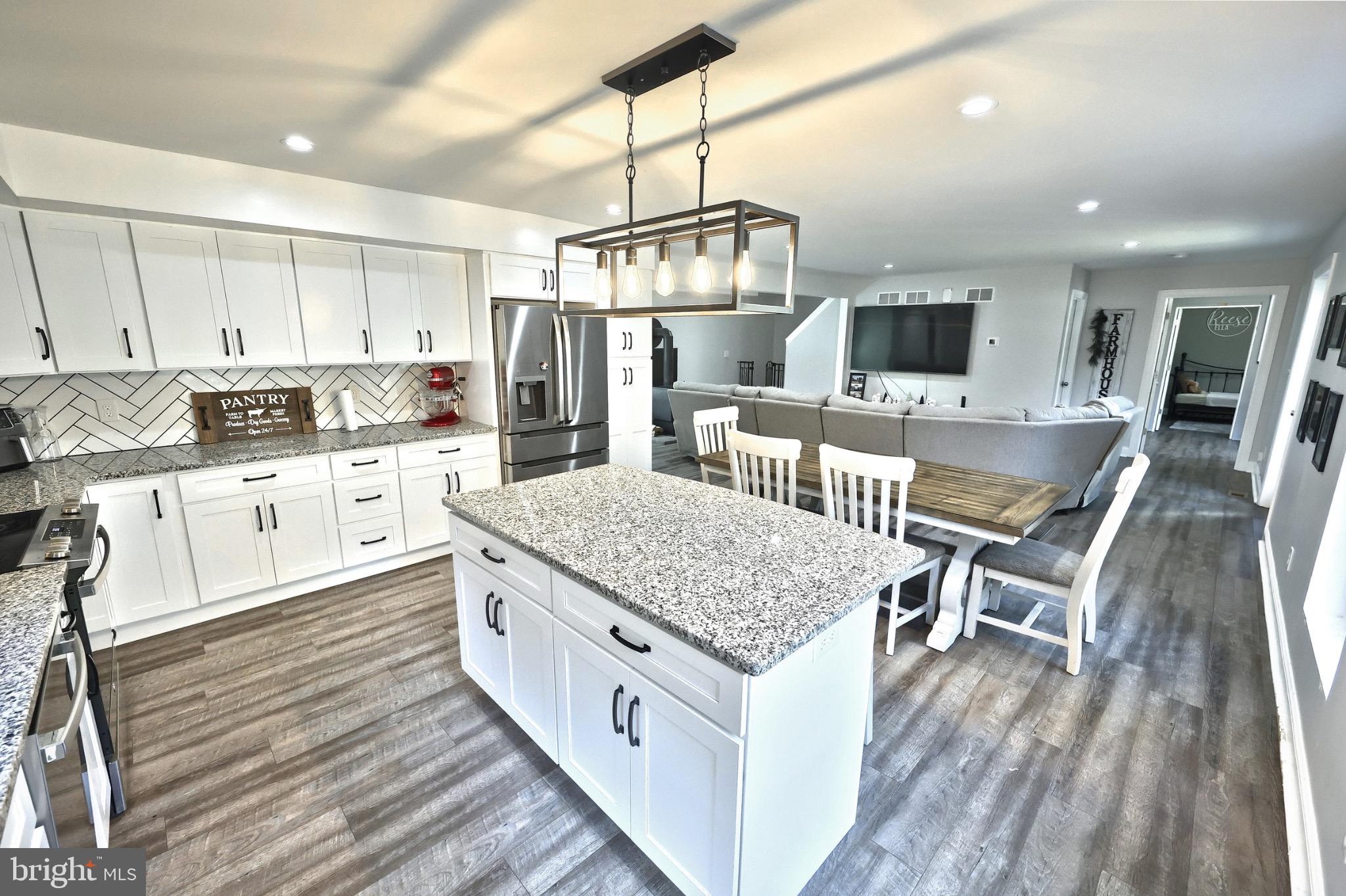 755 River Road York Haven, PA 17370 - Photo 26 of 58 a kitchen with stainless steel appliances granite countertop a stove oven and a white cabinets