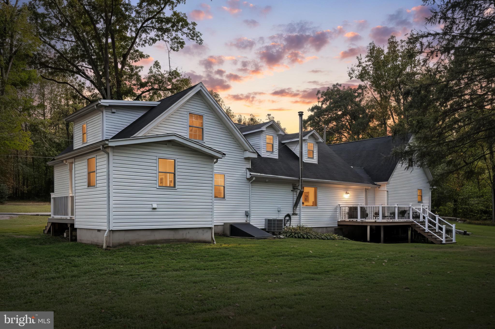 755 River Road York Haven, PA 17370 - Photo 3 of 58 a front view of a house with a garden