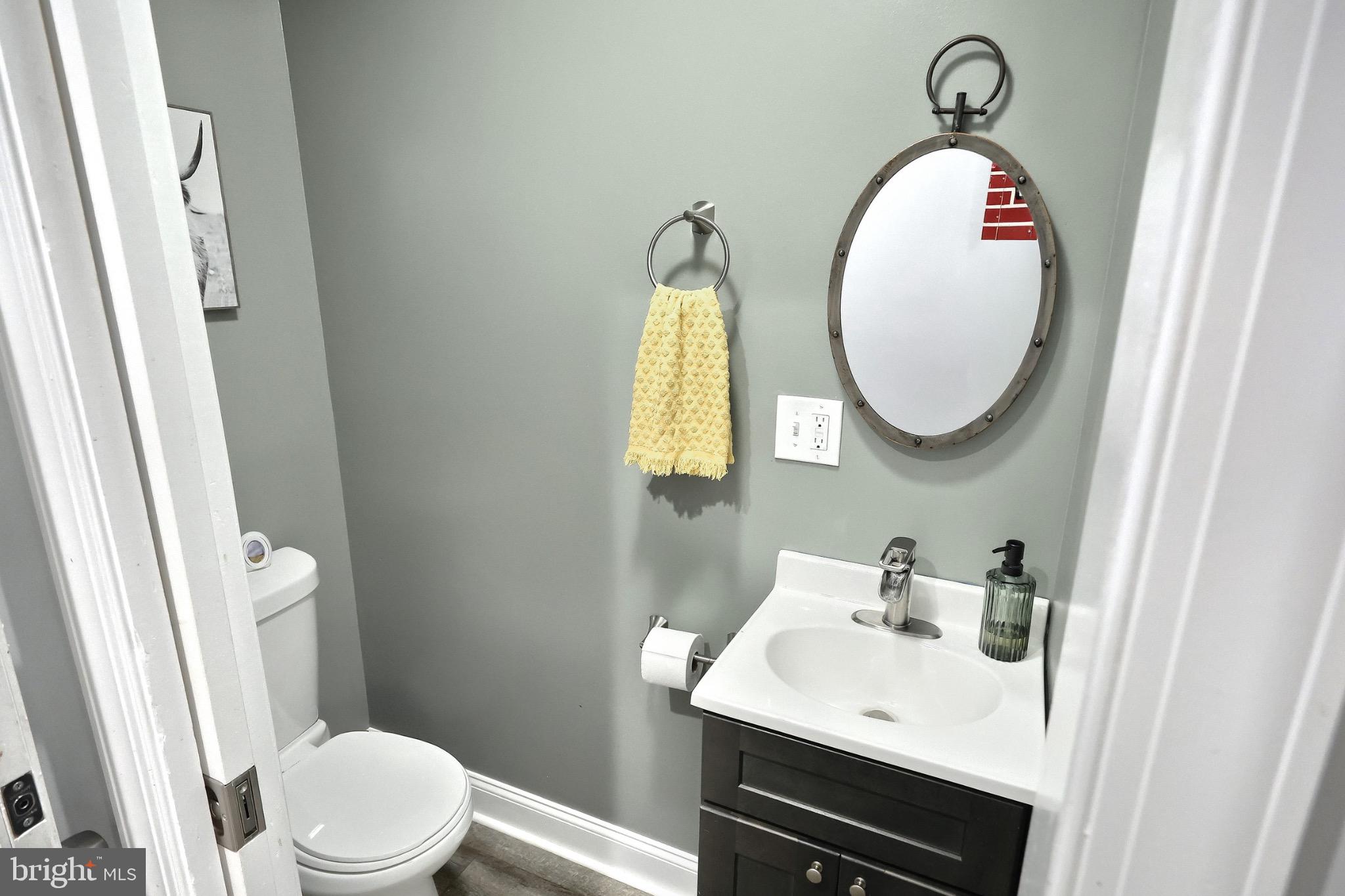 755 River Road York Haven, PA 17370 - Photo 34 of 58 a bathroom with a sink a mirror a toilet and a sink
