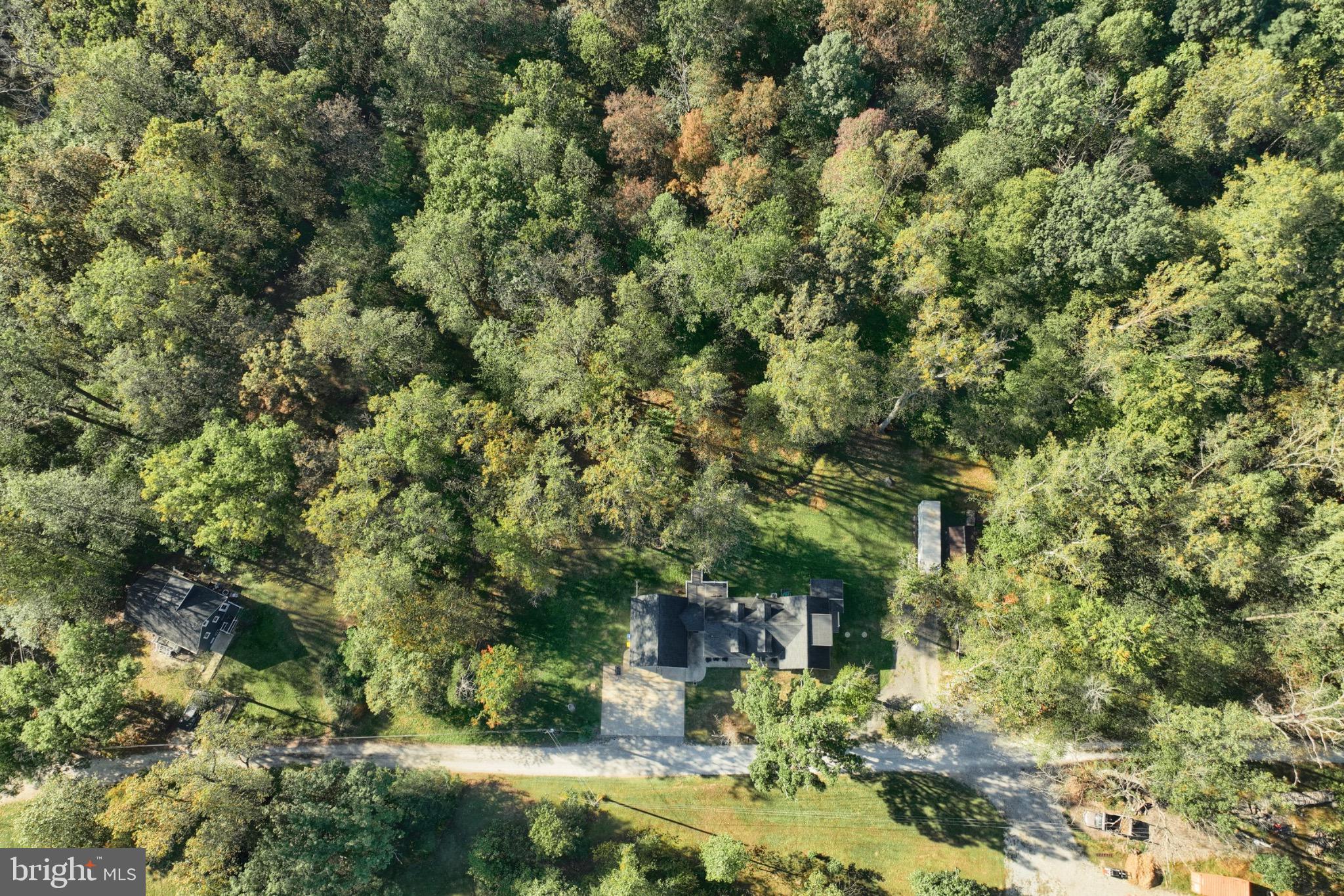 755 River Road York Haven, PA 17370 - Photo 54 of 58 an aerial view of residential house with outdoor space and trees all around