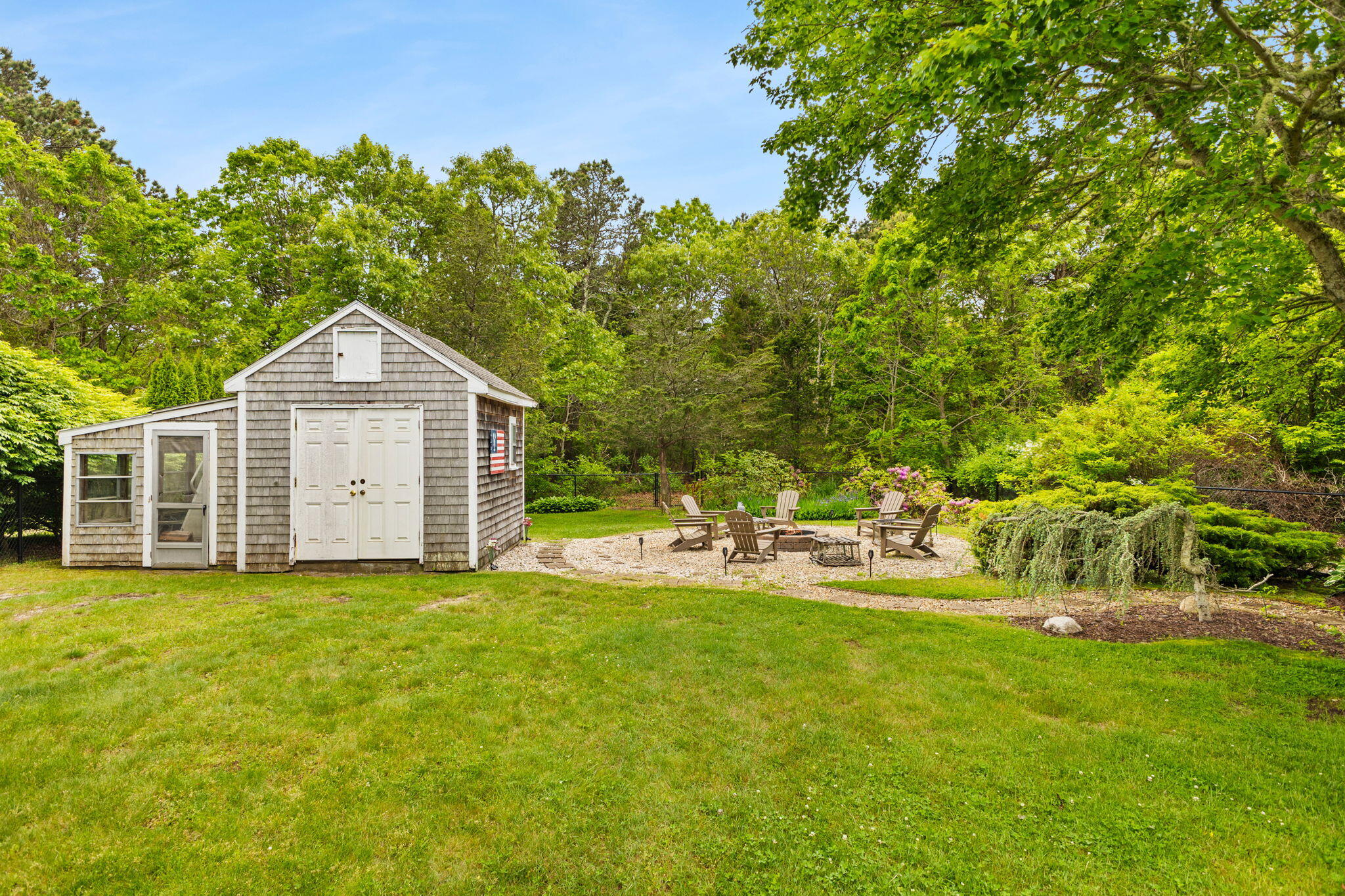 8 Stackpole Circle Bourne, MA 02532 - Photo 48 of 51 a view of a house with backyard porch and garden