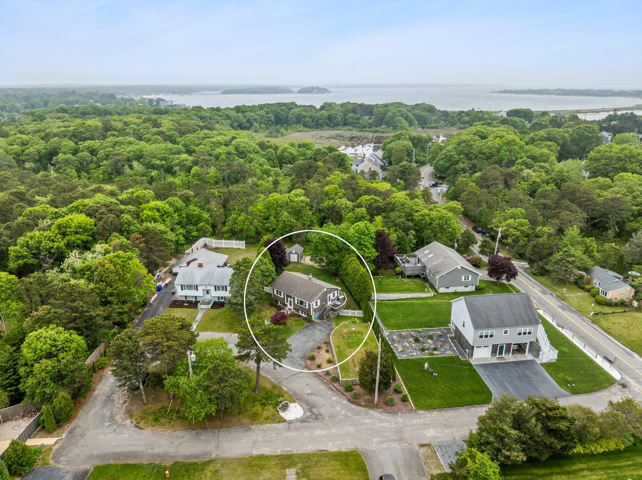 8 Stackpole Circle Bourne, MA 02532 - Photo 6 of 51 an aerial view of a house with a garden and lake view
