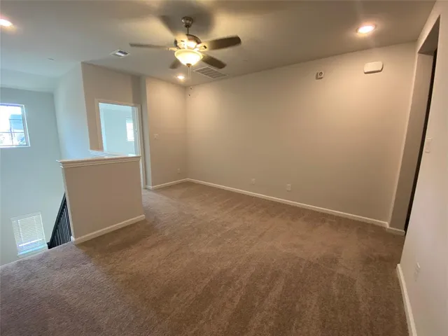 an empty room with a bathroom