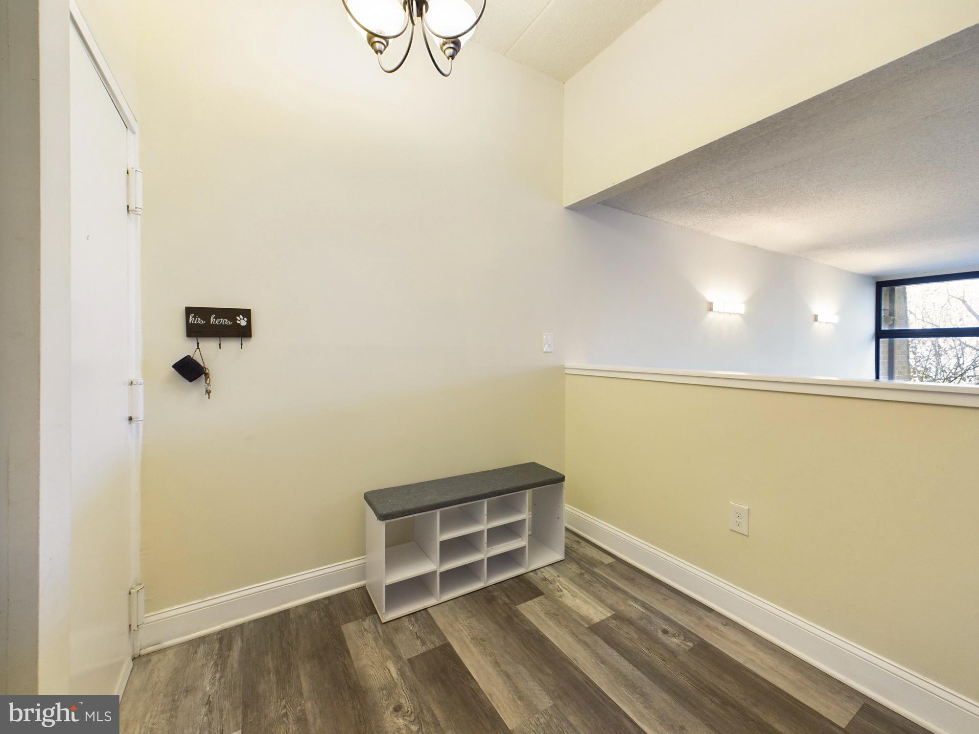 11566 Rolling Green Court, Unit 101 Reston, VA 20191 - Photo 2 of 38 a view of an empty room
