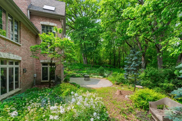 a backyard of a house with lots of green space