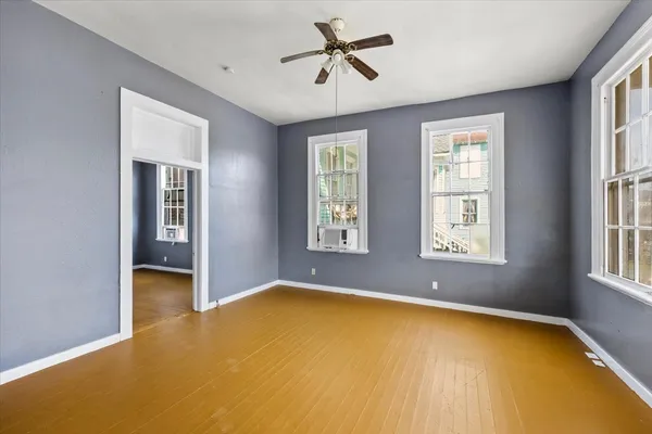 a view of an empty room with a window