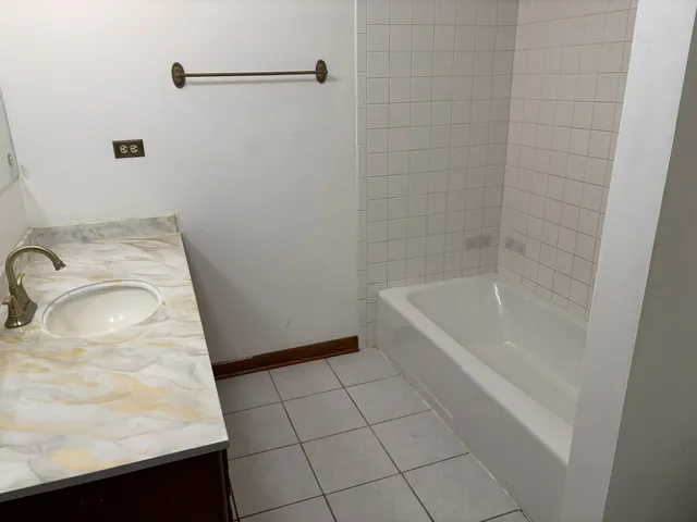 a bathroom with a toilet and a sink