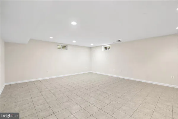 an empty room with a natural light