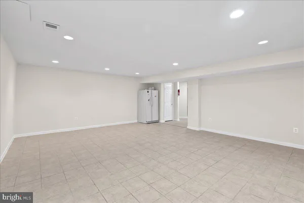 a view of small space with racks on the wall