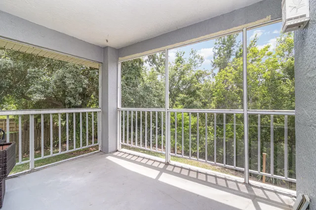 a view of a balcony with lake view