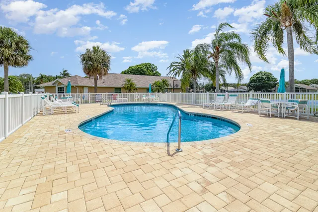 swimming pool with outdoor seating