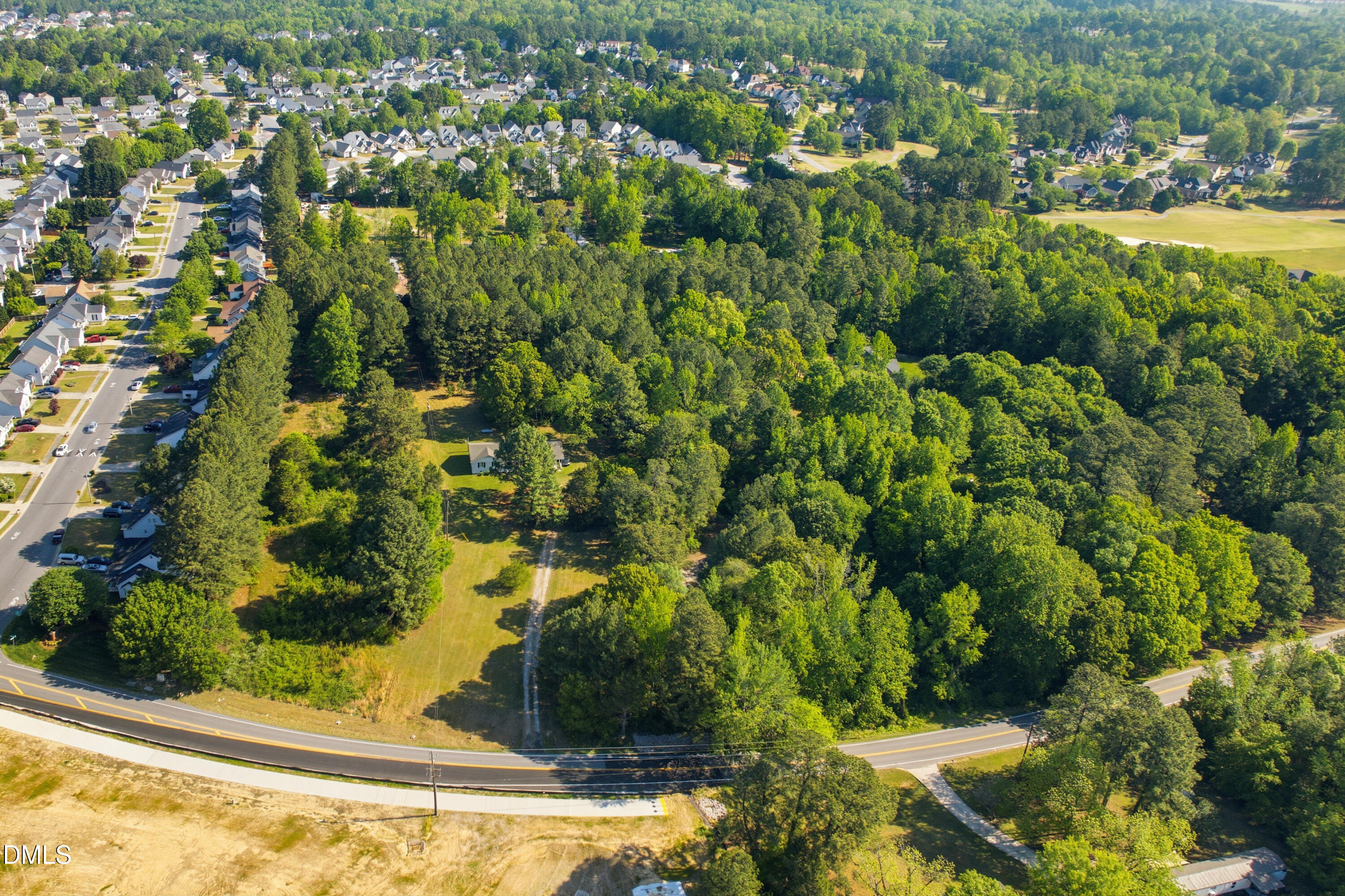7101 Battle Bridge Road Raleigh, NC 27610 - Photo 2 of 13 an aerial view of residential houses with yard