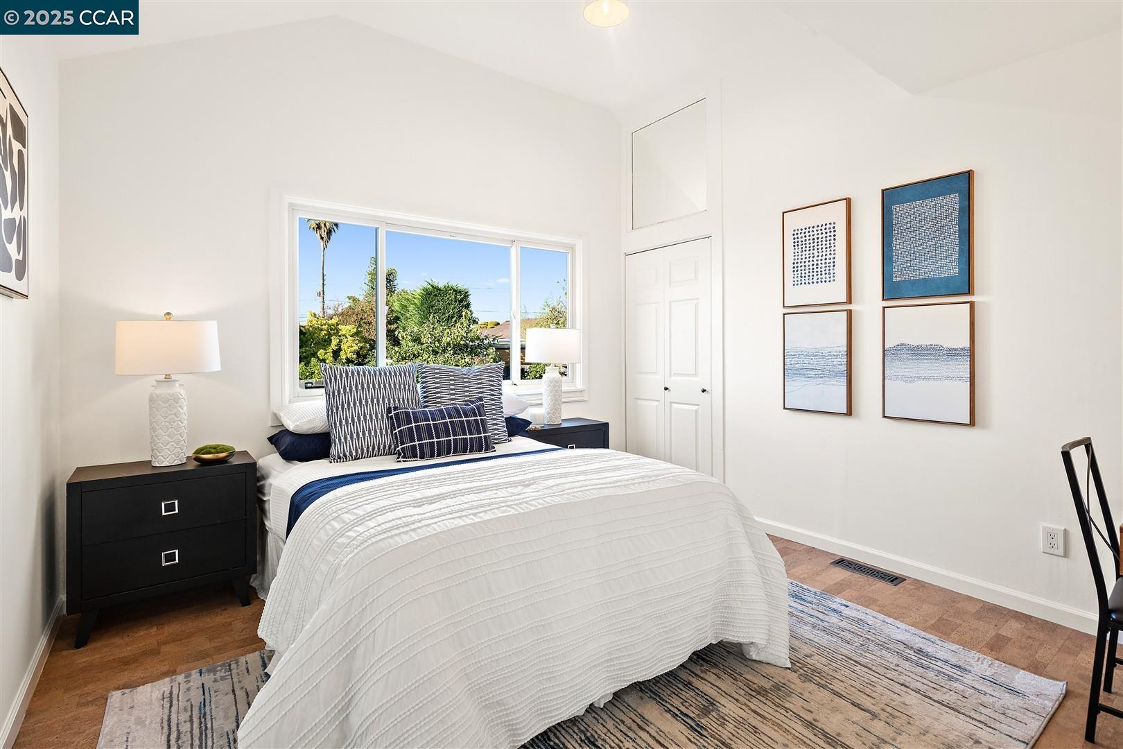 1233 Haskell Street Berkeley, CA 94702 - Photo 19 of 24 a bedroom with a bed and a window