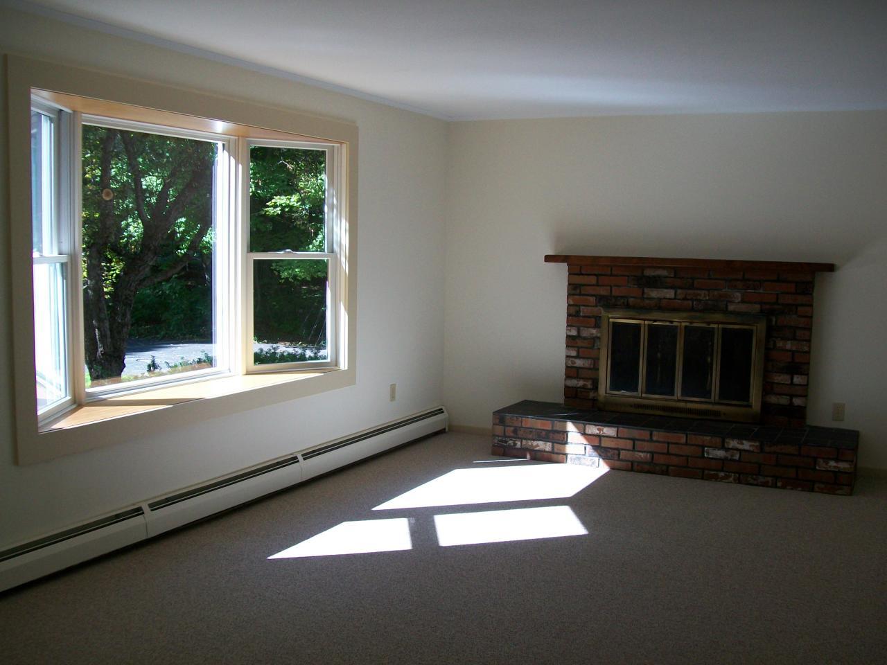 2017 Swamp Road Richmond, MA 01254 - Photo 6 of 16 a living room with a fireplace