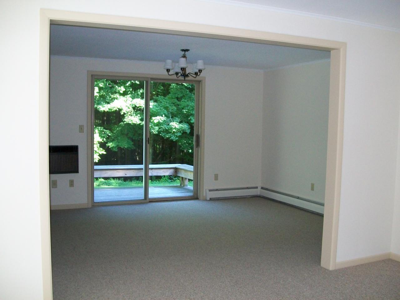 2017 Swamp Road Richmond, MA 01254 - Photo 8 of 16 a view of empty room with floor to ceiling window