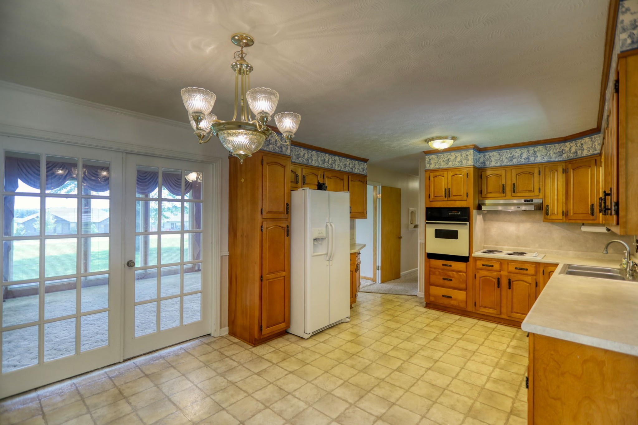 421 Fowler Ford Road Portland, TN 37148 - Photo 8 of 24 a view of a kitchen with furniture and stainless steel appliances