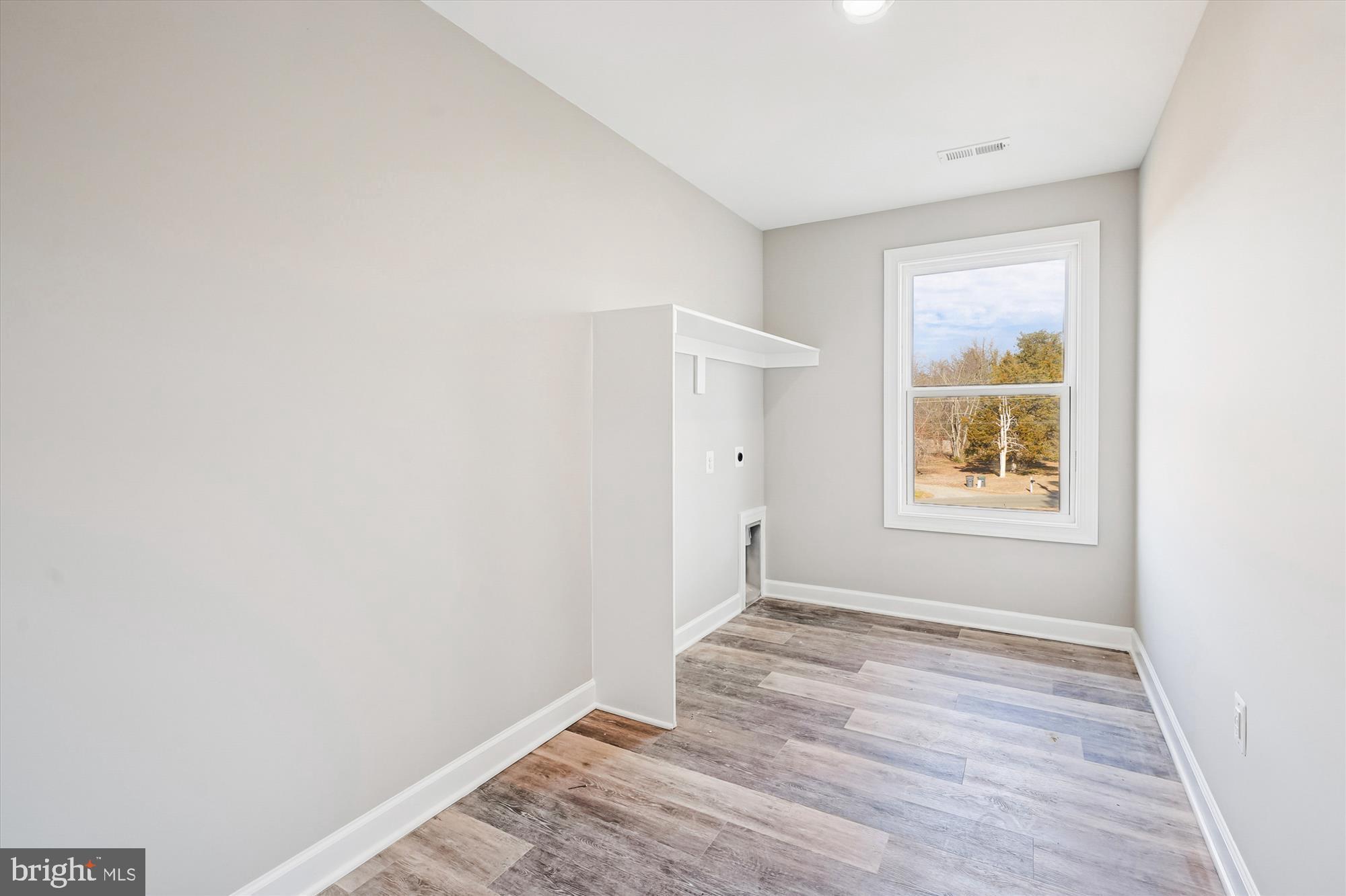 292 Colebrook Road Fredericksburg, VA 22405 - Photo 42 of 67 Bright & expansive laundry room upper level.