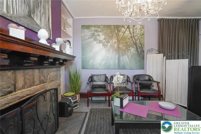 a room with furniture a large window and furniture