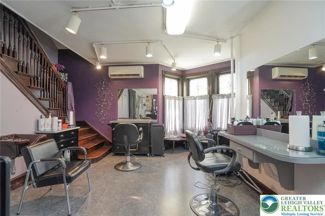 a view of a kitchen with a sink and a window