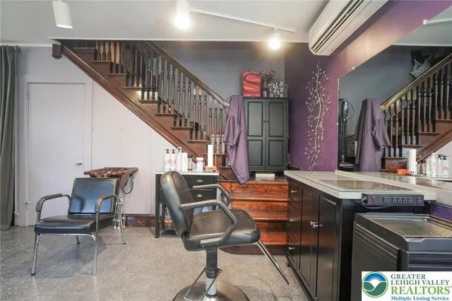 a kitchen with a white cabinets and white appliances