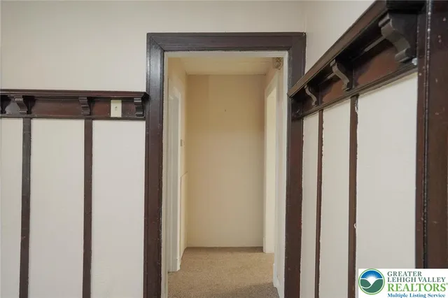 a view of a kitchen with sink cabinets and wooden floor