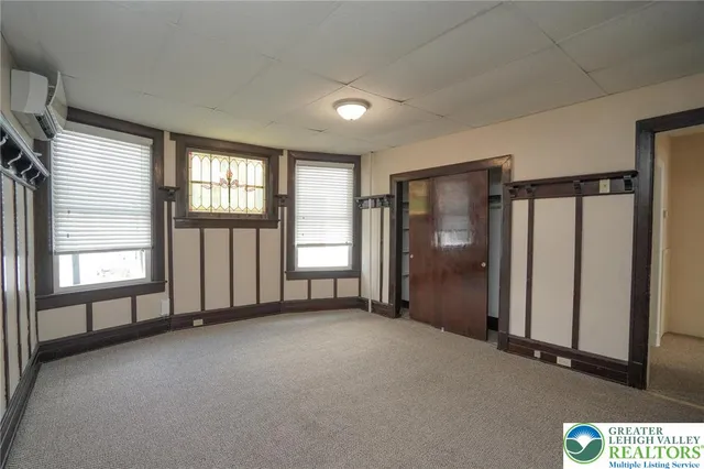 an empty room with windows