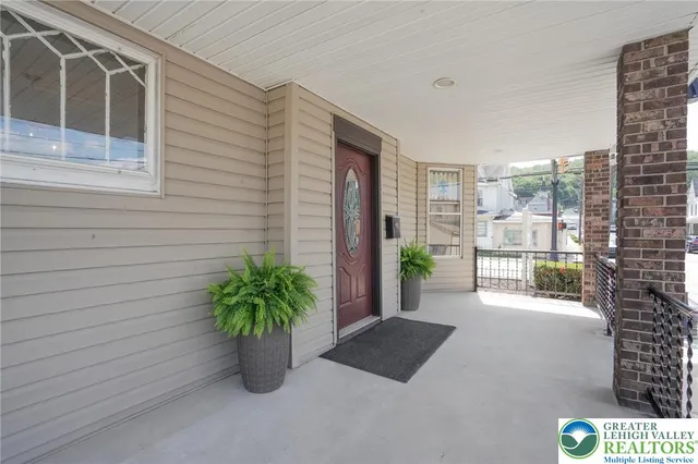a view of a street with potted plant